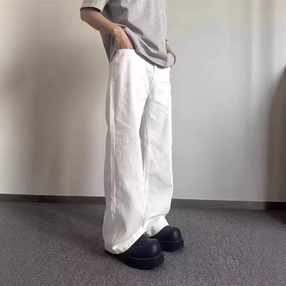 Men's white straight leg jeans with loose fit and mid waist design