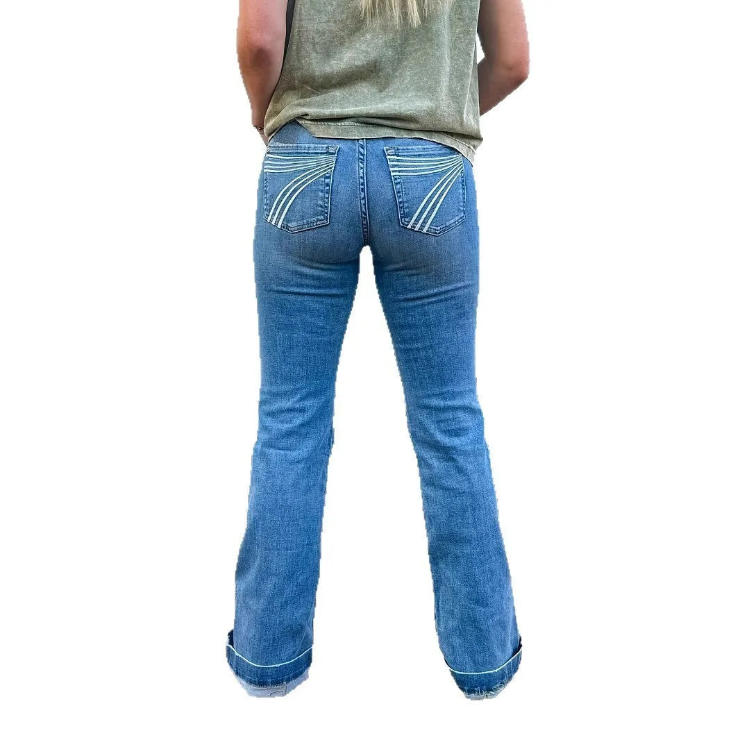Blue embroidery slim fit jeans with flared legs and mid-waist design on mannequin