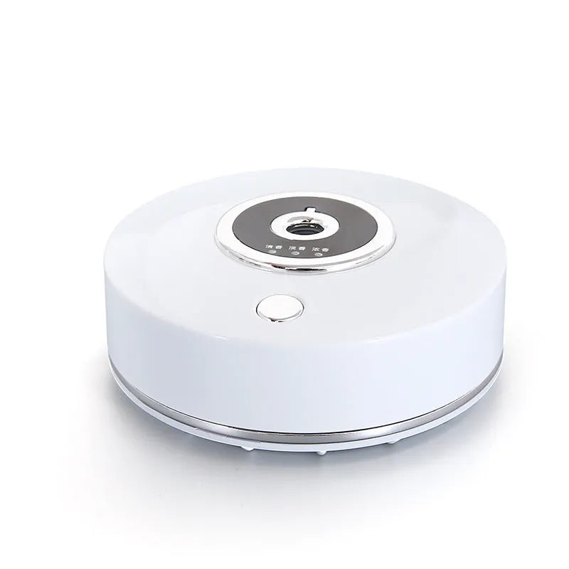 USB-powered plastic car perfume holder and aromatherapy machine in black, grey, or white.