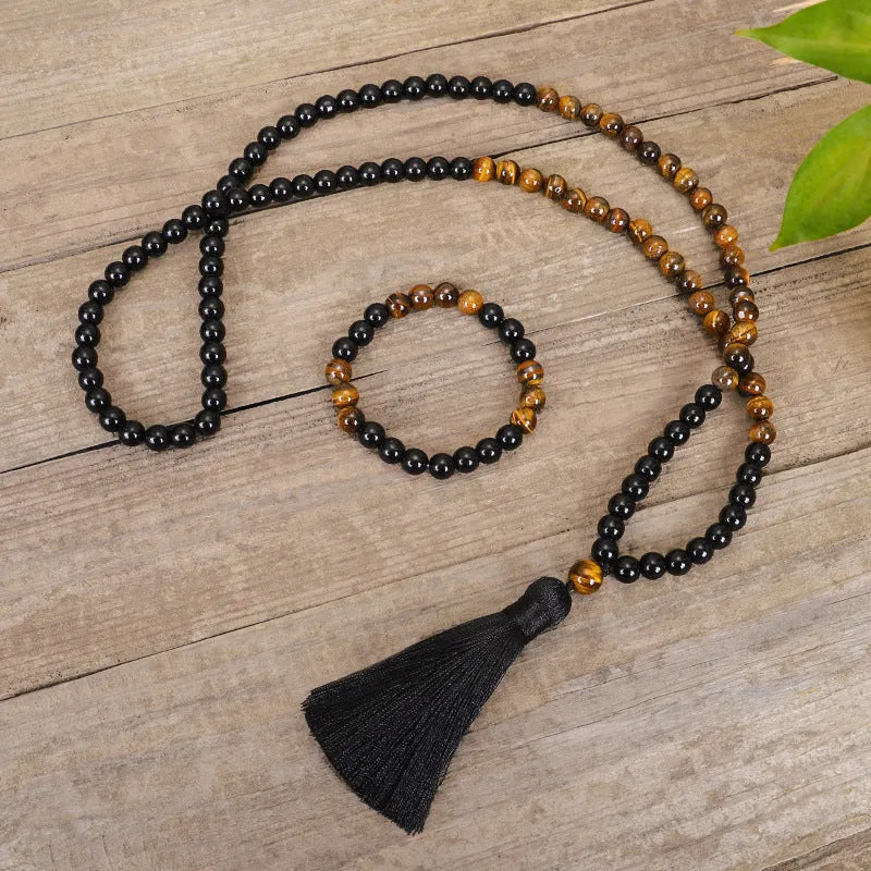 Tiger eye stone drop pendant necklace with tassel detailing on 81cm adjustable chain