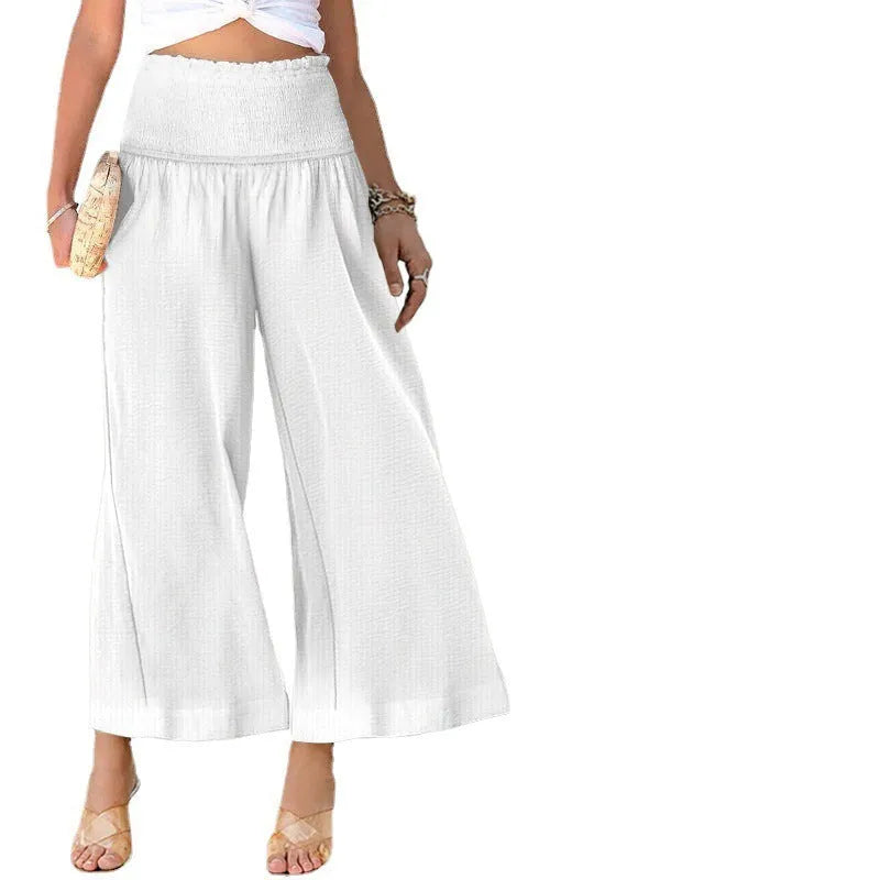 Women's high waist pleated cotton trousers in straight leg cropped style available in multiple colours