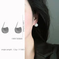 Geometric drop ear clips with diamond-cut golden beans in gold or white colour
