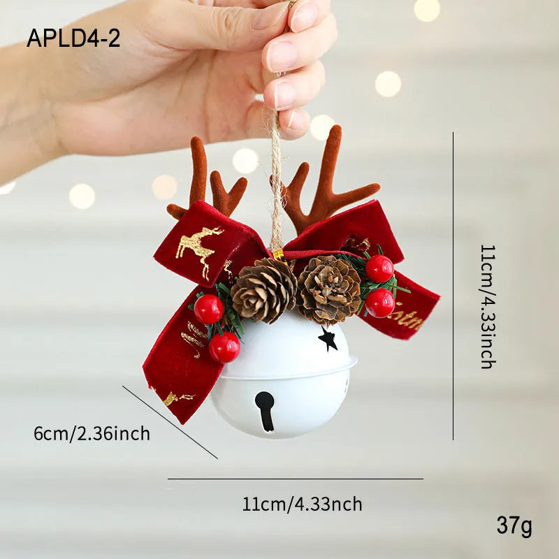 Wrought iron mixed pendant with antlers, bowknot, pine cone, and bell in golden finish