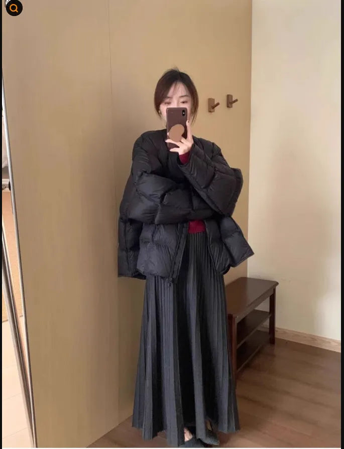 Knitted dress suit set with 3D pattern ethnic style showing sweater and skirt coordination in dark grey colour
