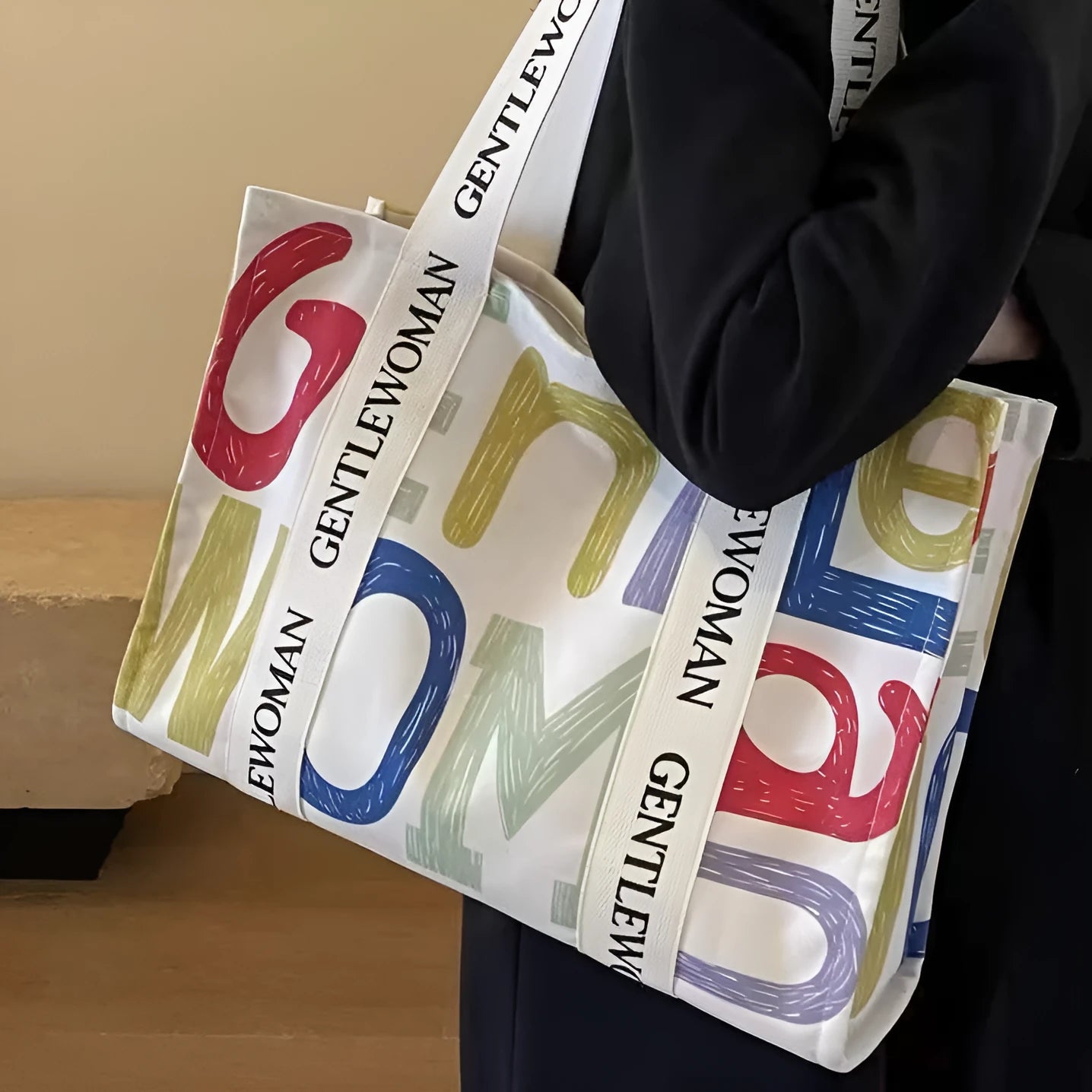 Large canvas tote bag with printed design, shown in multiple colour and pattern options.