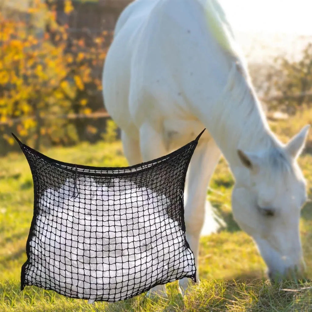Black woven PE rope hanging feeding bag for horses, shown with hay, next to a white version.