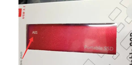 Ultra-thin metal external SSD portable hard drive in red, showing slim profile.