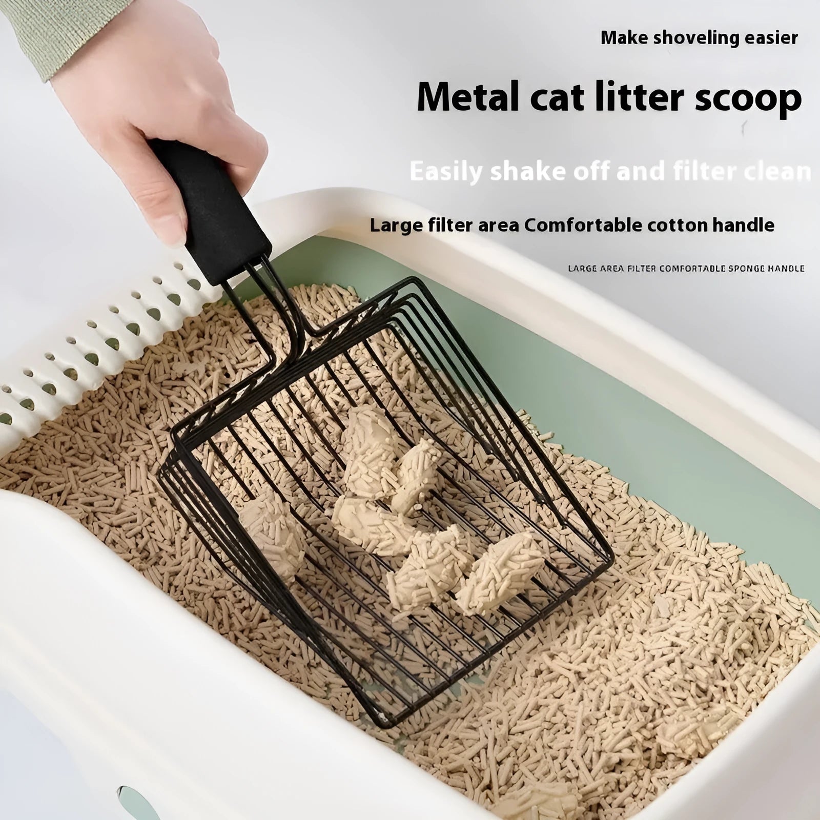 Black metal cat litter scoop with alloy construction and 0.8cm gap between tines