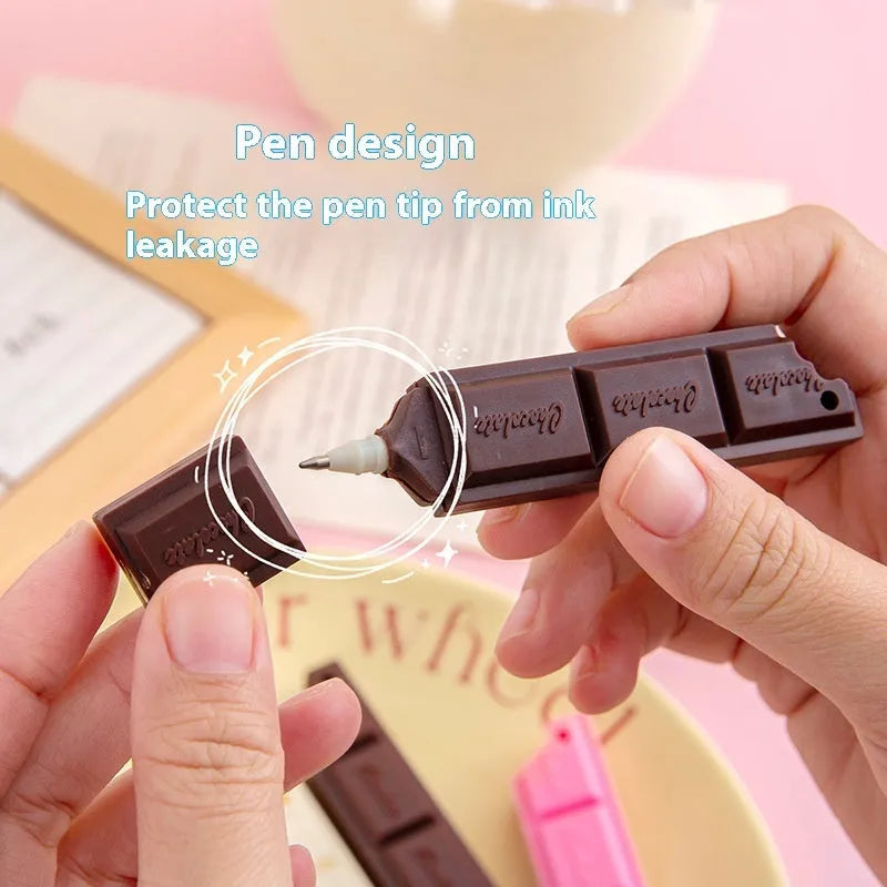 Chocolate ballpoint pen with cartoon food design, 0.5mm bullet tip, available in pink, beige, or brown colours