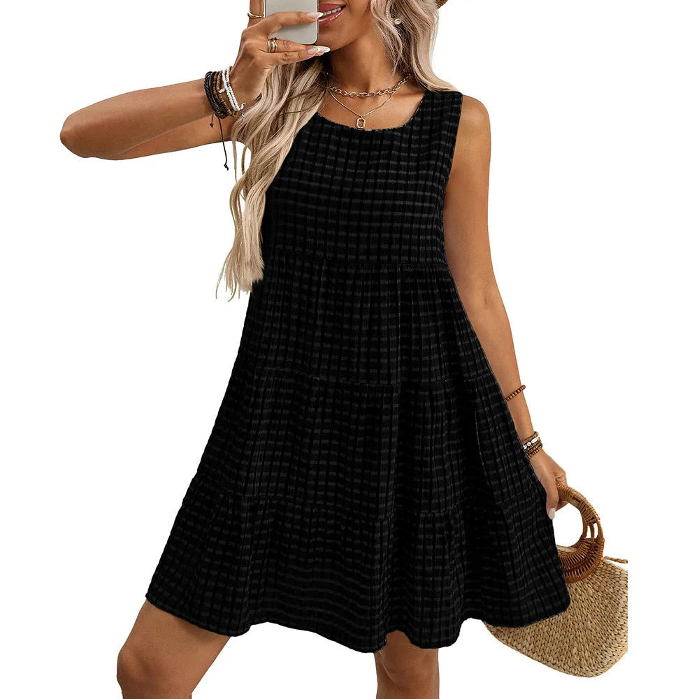 Light blue women's sleeveless plaid dress with high waist and loose swing skirt on a model.