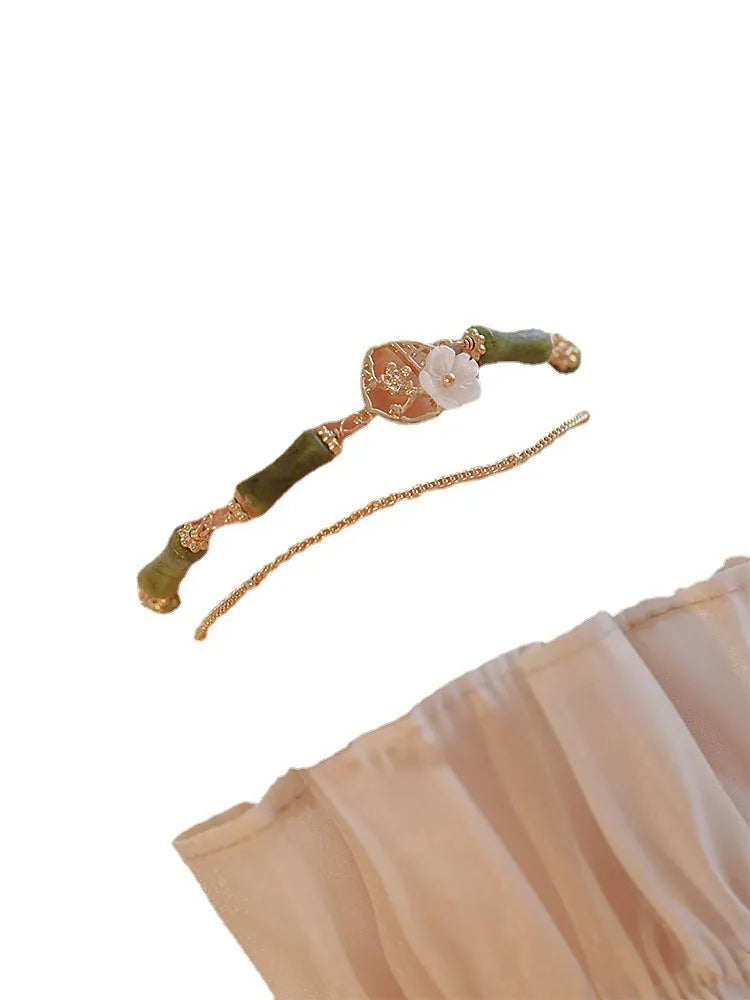 Natural olivine stone bracelet with Chinese double layer design and Bells of Ireland charms