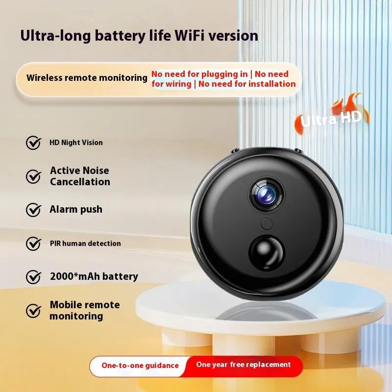 Wireless black security camera with 360-degree rotation on stand showing night vision capability