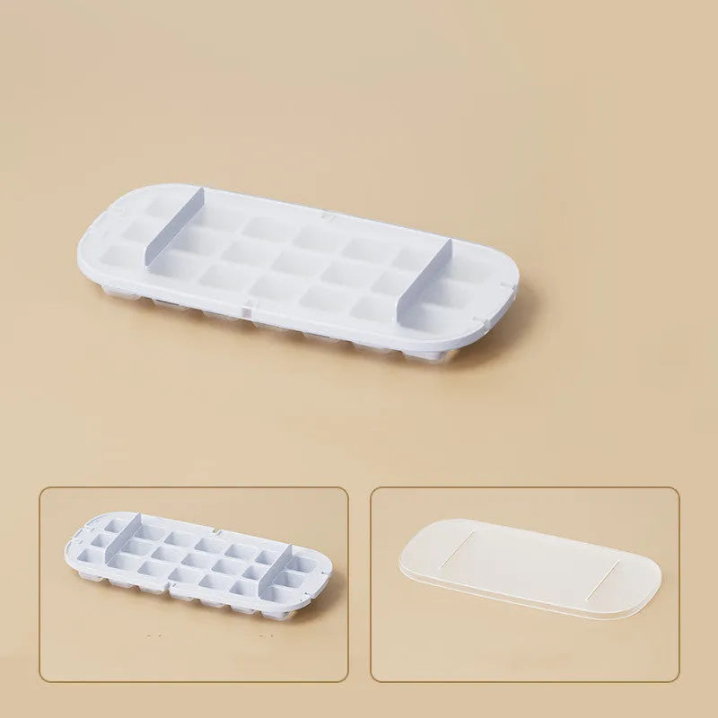 High-capacity plastic ice cube tray with grid pattern and ice shovel, shown in blue colour.