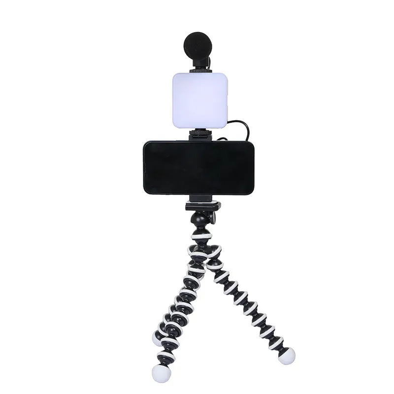 Mini square outdoor camera flash on a small tripod with a rotatable head