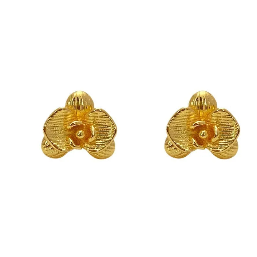 Retro flower earrings with petal detailing in gold or silver electroplated finish on copper