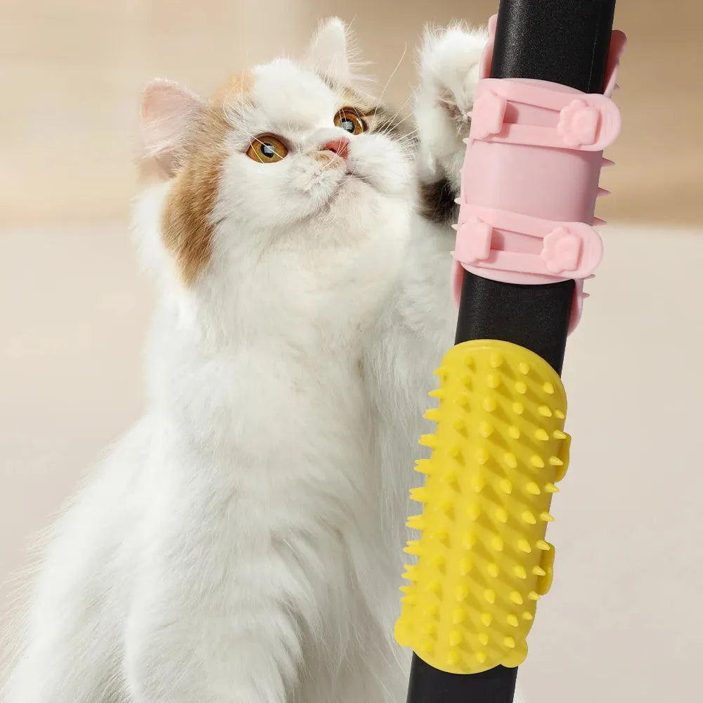 Silicone cat hair removal massage comb attached to a wall corner with rounded teeth for grooming