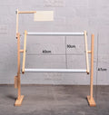 Solid pine wood vertical embroidery frame with height adjustment mechanism on a desktop