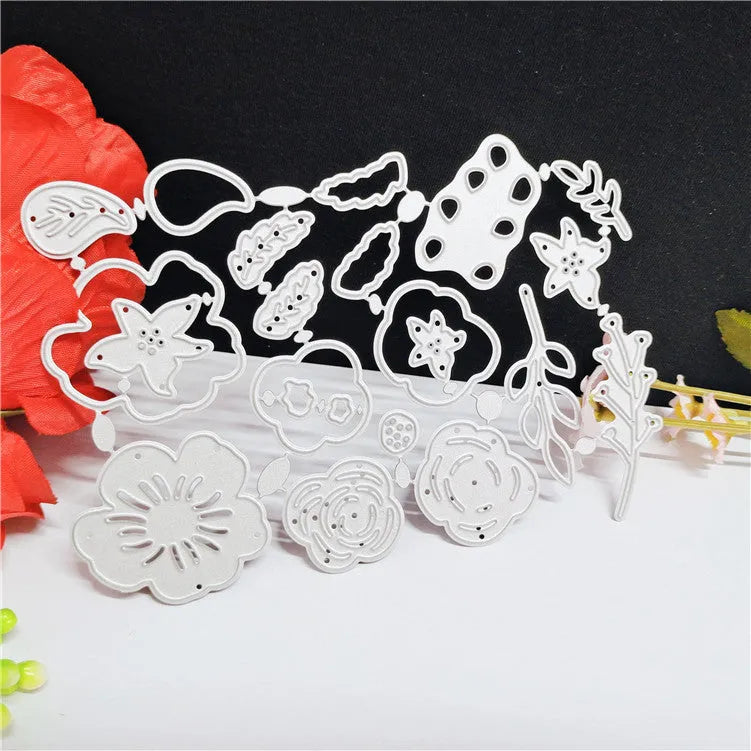 Silver carbon steel flower pattern paper cutting die measuring 14.3 by 9.9 centimetres