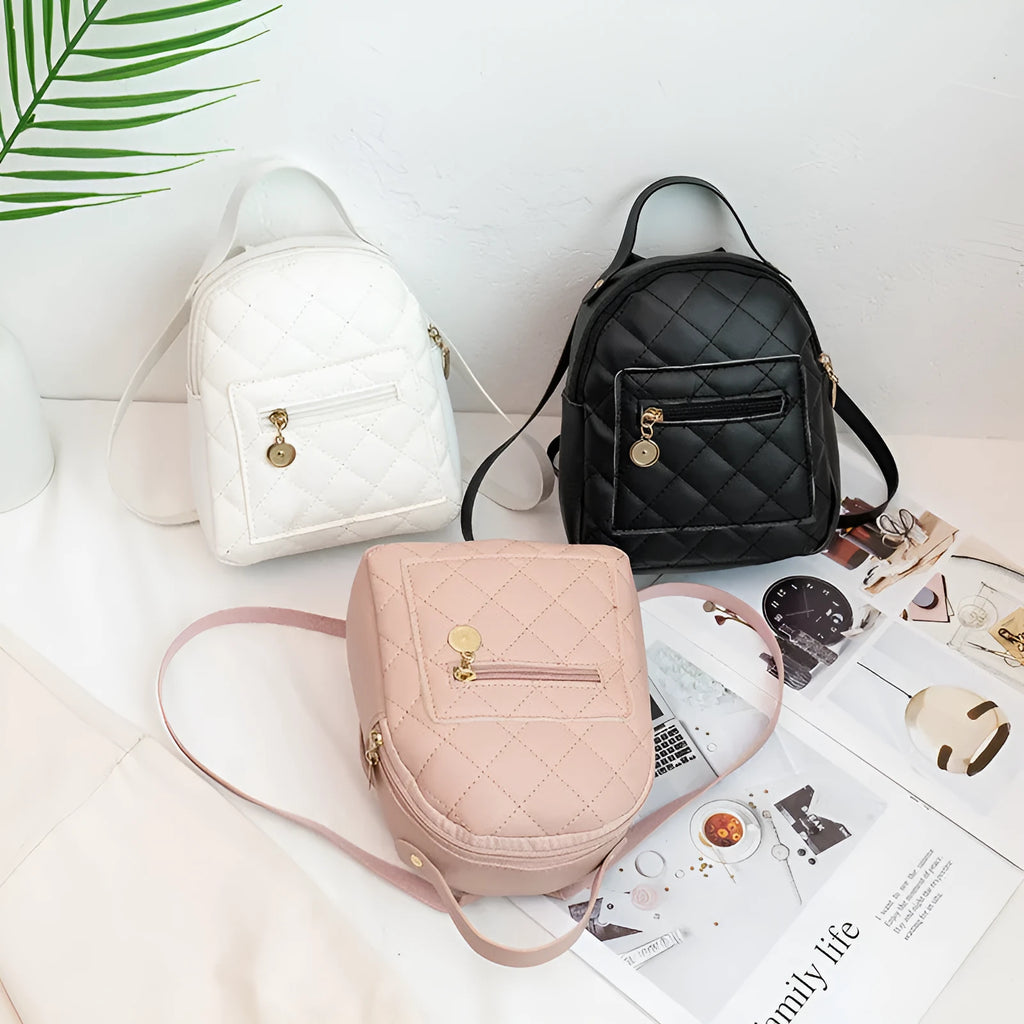 Hard white Korean style embroidered girls backpack showing sandwich pocket and soft carry handle.