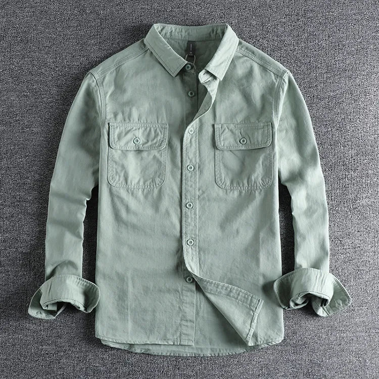 Men's light grey loose fit cardigan-style shirt with an overalls design and long sleeves.