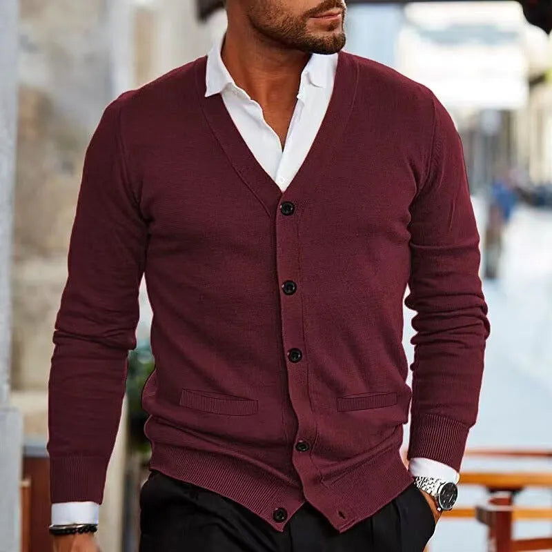 Men's slim fit acrylic cardigan sweater in autumn colours on a hanger