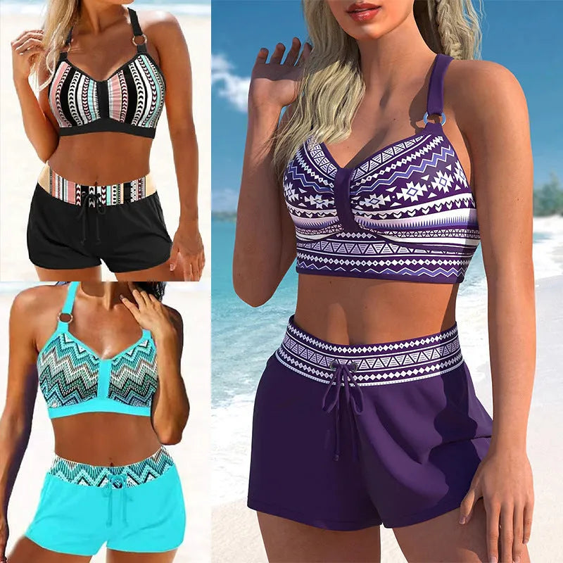 Women's navy blue and print two-piece bikini swimsuit made from polyester.