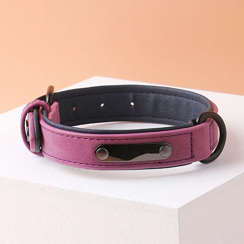 Adjustable dog collar in purple showing front PU material and back microfiber fabric, with a secure buckle closure.