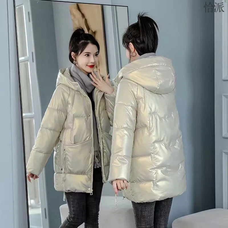 A women's loose-fitting thick hooded winter jacket in an acrylic polyester fabric.