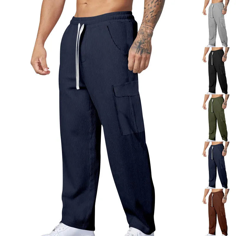 Men's straight-leg corduroy cargo trousers in brick red with a drawstring waist
