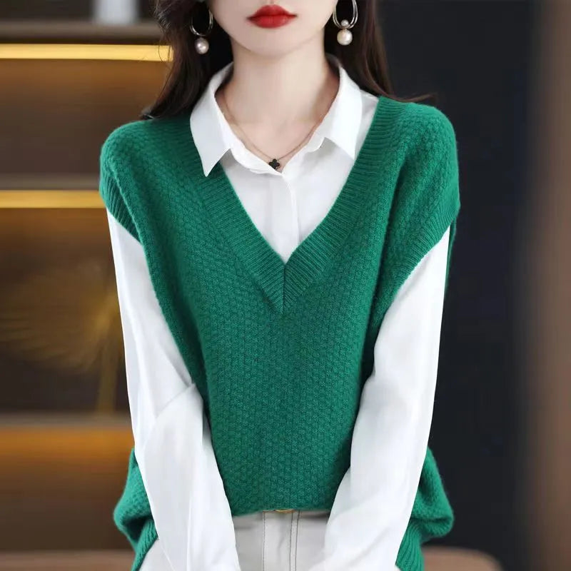 Sleeveless V-neck pullover vest with a textured 3D knit pattern in acrylic fabric, shown in multiple colours.