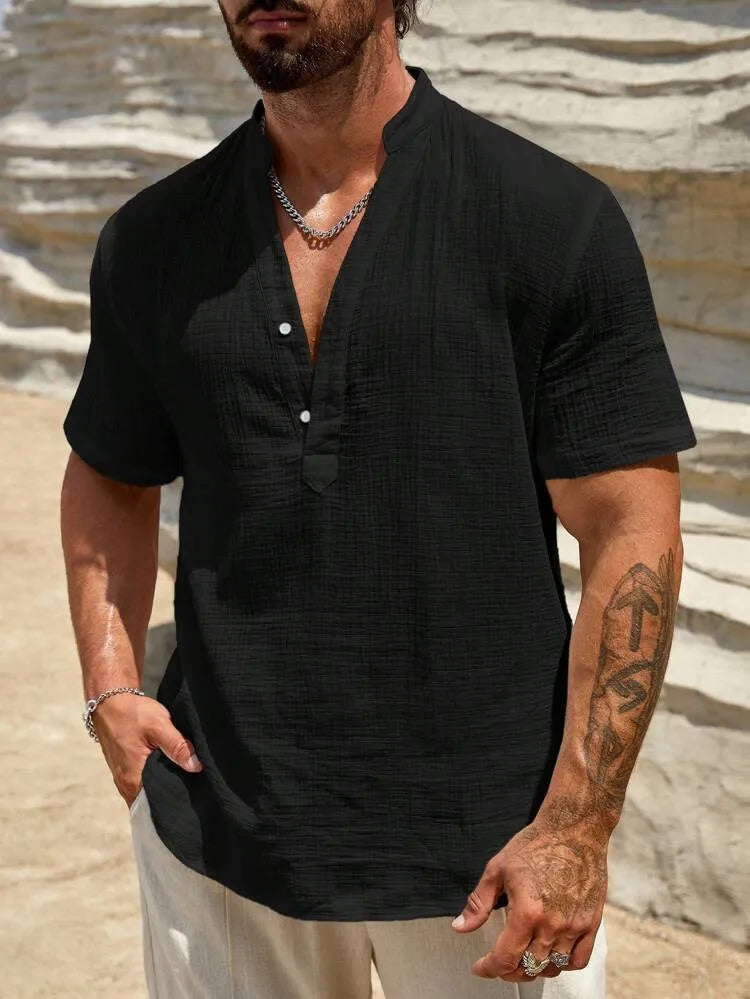 Men's solid colour short sleeve casual shirt with stand collar in a light blue shade.