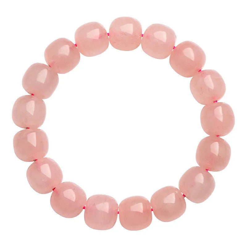 Pink natural crystal barrel bead bracelet with 8x10mm geometric design and polished finish