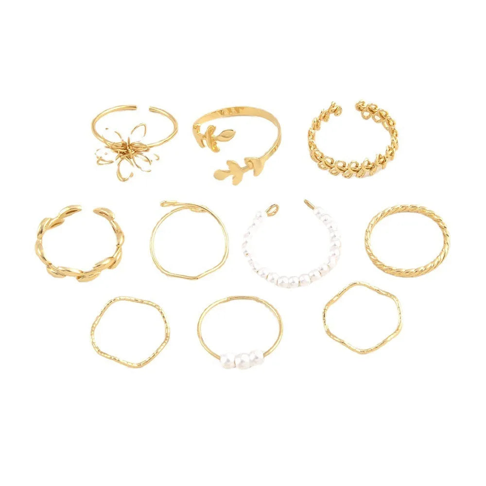 Gold tone openwork flower ring with electroplated glossy finish and women's jewellery design