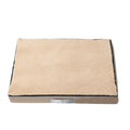 Removable washable memory sponge dog mat in brown, showing soft texture and size.