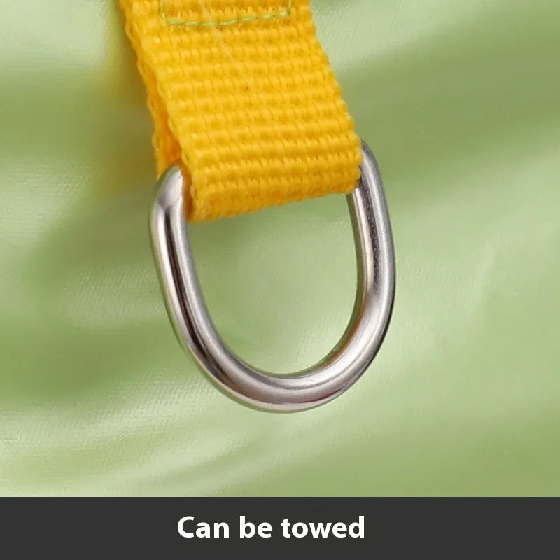 Green four-legged waterproof dog coat on a pet, showing full coverage and casual style.