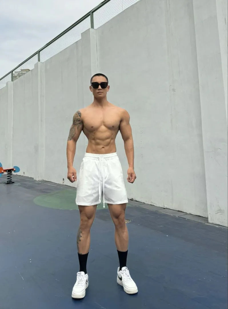 Men's ice silk quick-drying double-layer casual shorts in multiple colours.