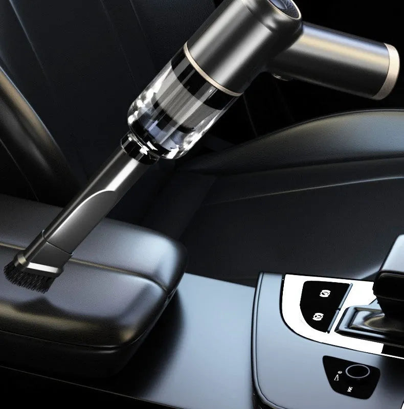 Black wireless car vacuum cleaner with multiple attachments including brushes and nozzles