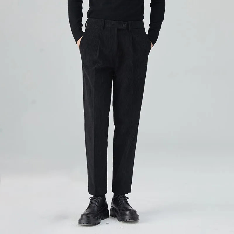Men's straight-leg corduroy trousers in loose fit, shown in beige colour