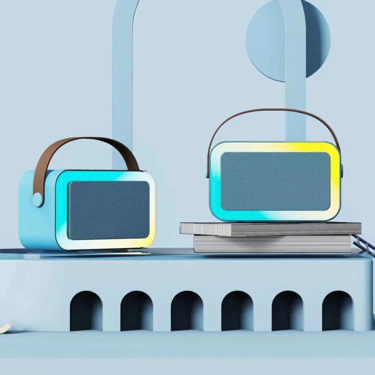 White, pink, or sky blue portable Bluetooth speaker with built-in karaoke microphone and coloured LED lights.