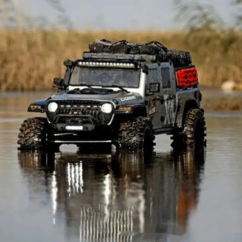 Plastic Big Leopard remote control electric rock crawler with four-wheel drive in Gun Gray colour on dirt surface