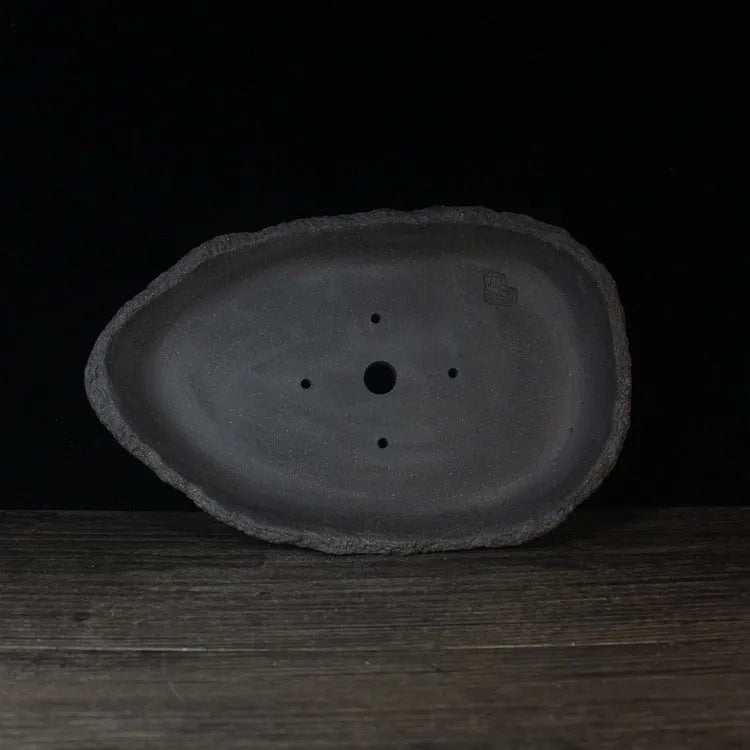 Handmade purple clay flowerpot showing colour style options and drainage hole choices for indoor plants.