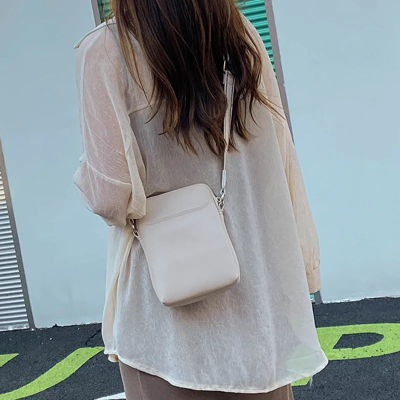 Solid colour small crossbody shoulder bag for women with mobile phone compartment