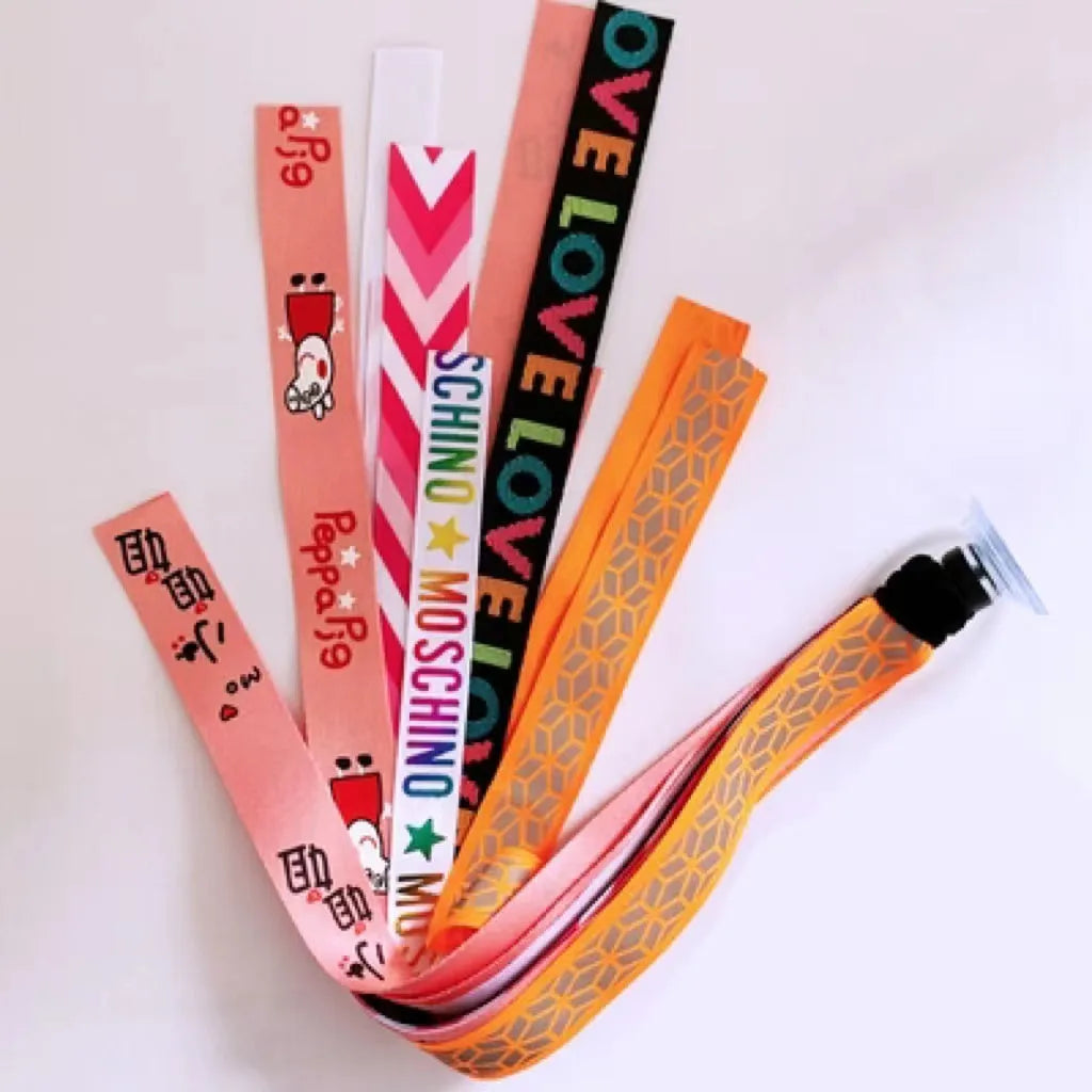 Colourful decorative ribbon streamers attached to a children safety helmet for skating or skiing