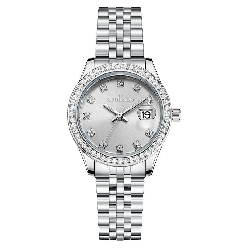 Women's silver calendar watch with circular 32mm dial and stainless steel folding buckle