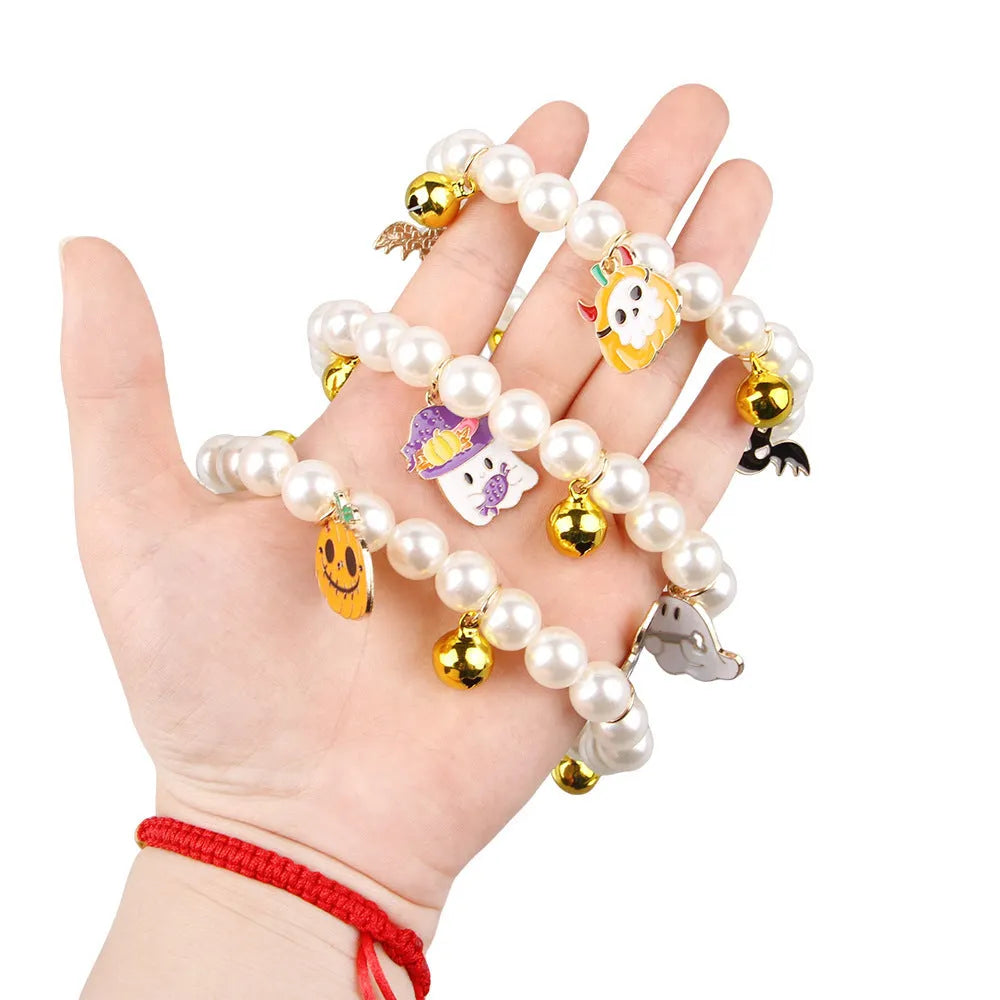 Halloween cat collar decoration with simulated pearl necklace in pumpkin-themed colours