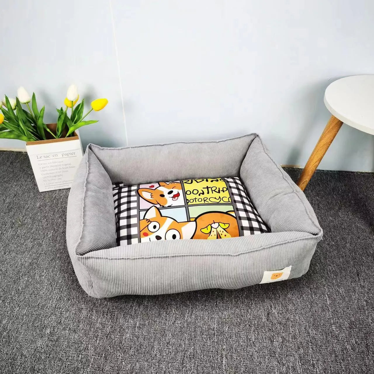 Soft fabric pet winter bed for dogs and cats in light blue colour, showing plush velvet texture.