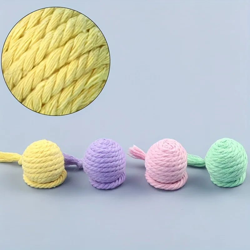 Colourful cat toy ball with rope tail and internal jingle bell in two size options