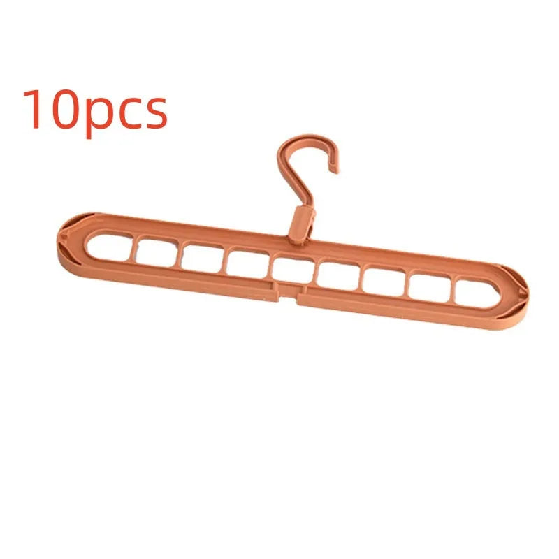 Plastic nine-hole folding pant hanger in multiple colours for dormitory wardrobe organisation