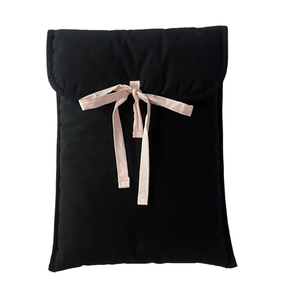 Black and white quilted women's laptop bag with a ballet bow and striped pattern.