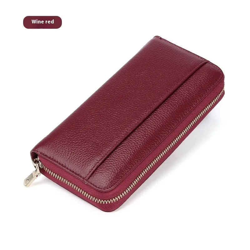 Women's long genuine leather wallet in multiple colours showing zip-around closure and anti-theft card slots.